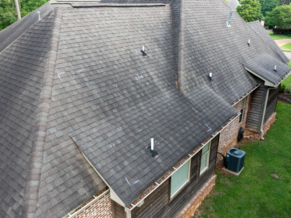Damaged Roof with Markings from Roof Inspection in Frisco Texas