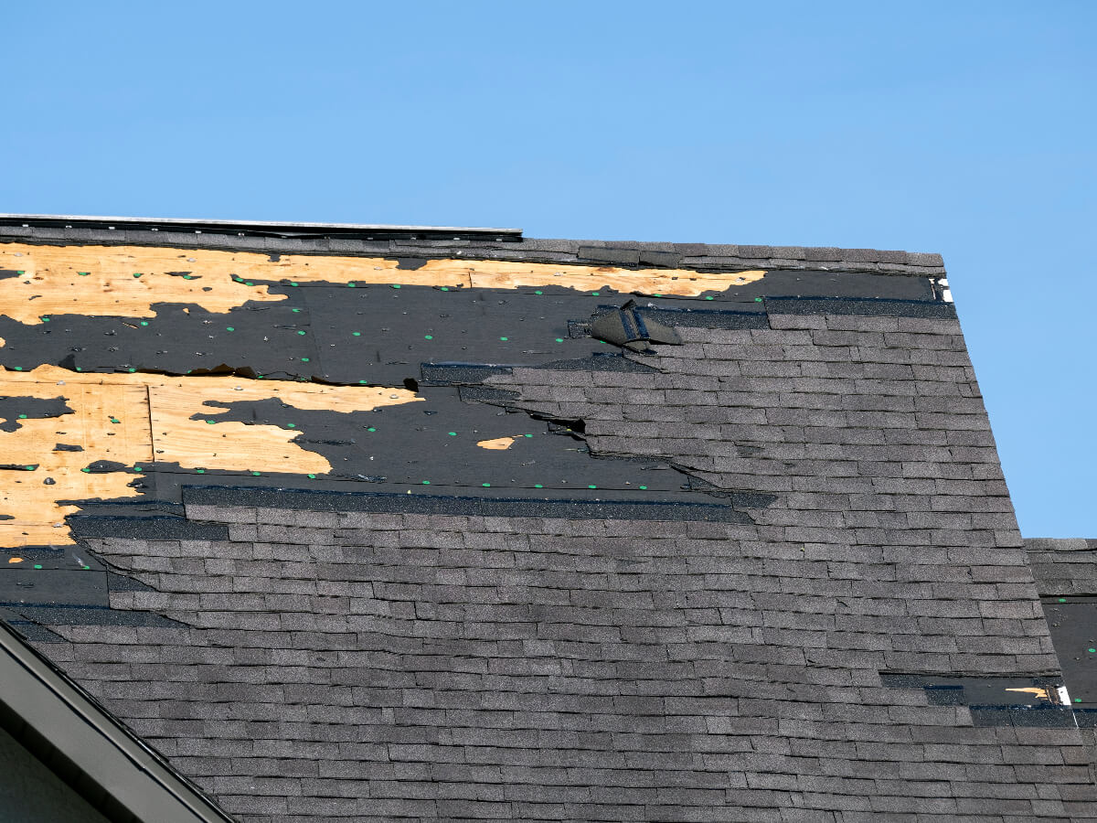Roof with Missing Shingles Following High Winds in Frisco Texas