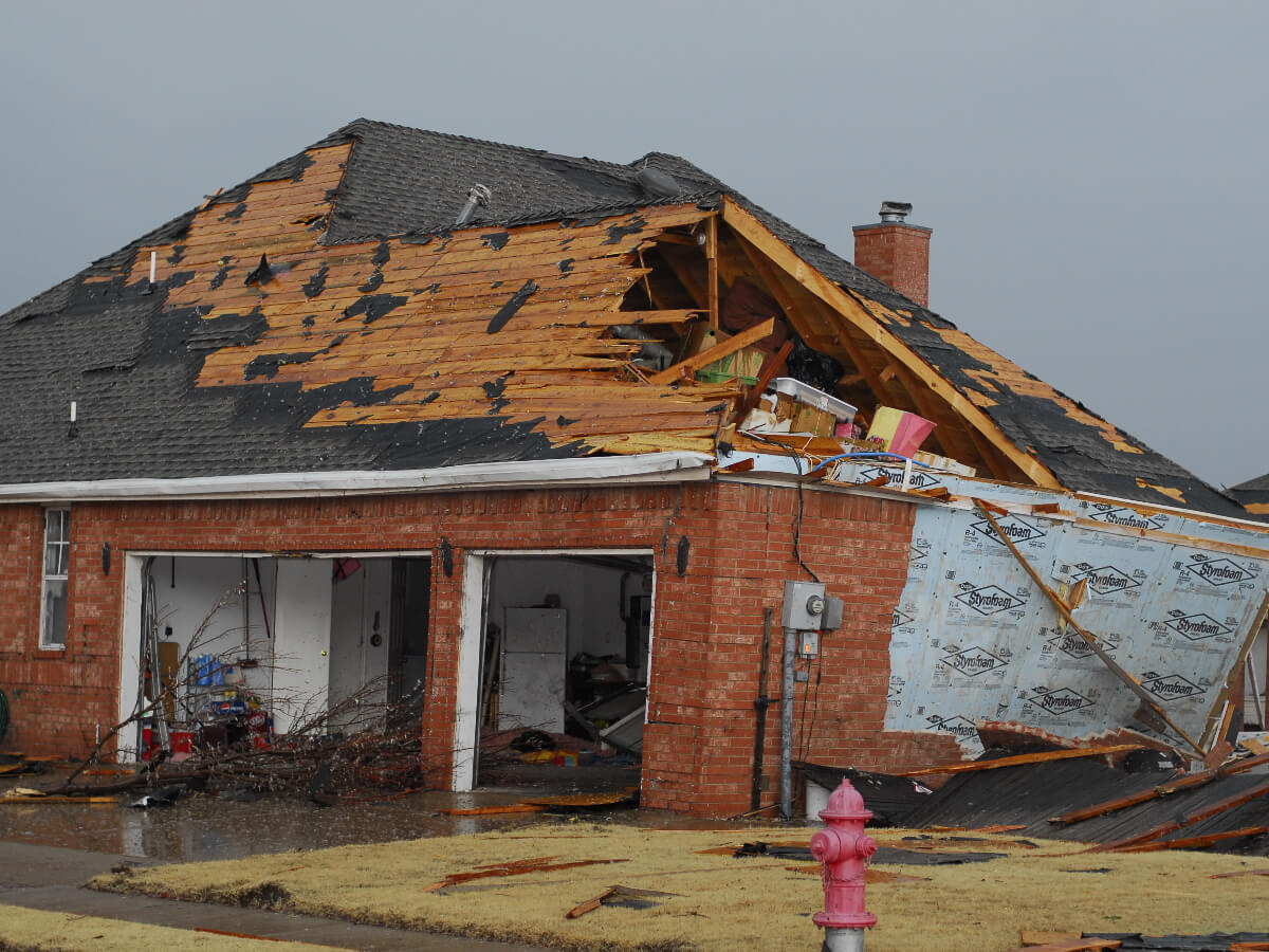 House with Roof Damage Following Tornadoes in North Texas